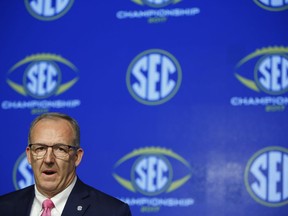 SEC Commissioner Greg Sankey speaks with the media during an NCAA college football news conference for the Southeastern Conference championship game at the Mercedes-Benz Stadium in Atlanta,  Friday, Dec. 1, 2017. Auburn and Georgia meet on Saturday for the SEC title.
