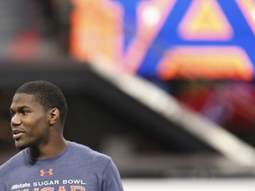 Auburn running back Kerryon Johnson (21) looks on practice for Saturday's Southeastern Conference championship NCAA college football game against Georgia at Mercedes-Benz Stadium in Atlanta, Friday, Dec. 1, 2017.