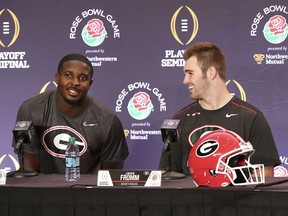 Georgia tailback Sony Michel and quarterback Jake Fromm share a laugh during press conferences for the Rose Bowl Game on Thursday, Dec. 28, 2017, in Los Angeles.
