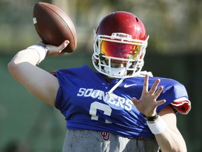 Oklahoma quarterback Baker Mayfield participates in drills during a short segment of practice that was open to the media Friday, Dec. 29, 2017, in Carson, Calif. Oklahoma plays Georgia in a semifinal of the College Football Playoff on New Year's Day.