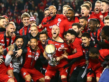 Toronto FC captain Michael Bradley lifts the MLS Cup trophy on Dec. 9.