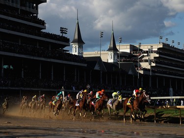 The field heads into the first turn during the 143rd running of the Kentucky Derby at Churchill Downs in Louisville on May 6.
