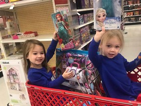 With her $100 from Severna Park United Methodist Church, Jillian Beam took her daughters Hannah, 2, and Kennedy, 4, to pick out toys for children at Johns Hopkins Hospital.