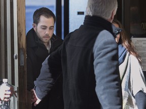 Christopher Calvin Garnier, charged with second-degree murder in the death of Truro police officer Const. Catherine Campbell, heads from Nova Supreme Court during a break in Halifax on Wednesday, Dec. 20, 2017.