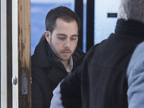Christopher Calvin Garnier, charged with second-degree murder in the death of Truro police officer Const. Catherine Campbell, heads from Nova Supreme Court during a break in Halifax on Wednesday, Dec. 20, 2017.