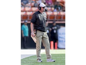Houston head coach Major Applewhite looks on as his team plays Fresno State in the first half of the Hawaii Bowl NCAA college football game Sunday, Dec. 24, 2017, in Honolulu.