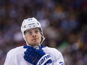 Toronto Maple Leafs centre Auston Matthews prepares to take a faceoff against the Vancouver Canucks on Dec. 2.