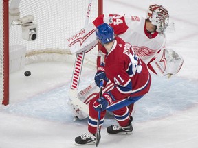 Paul Byron of the Canadiens scores against Detroit Red Wings goaltender Petr Mrazek during first period action in Montreal on Saturday night.