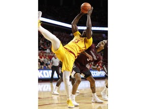 Iowa State forward Solomon Young, left, grabs a rebound over Maryland-Eastern Shore forward LeAndre Thomas during the first half of an NCAA college basketball game, Wednesday, Dec. 20, 2017, in Ames, Iowa.