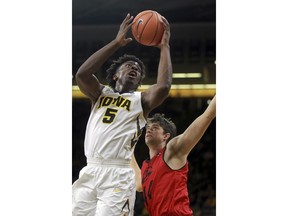 Iowa's Tyler Cook goes up for a shot during an NCAA college basketball game against Southern Utah in Iowa City, Iowa, Tuesday, Dec. 19, 2017.