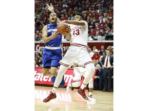Indiana's Juwan Morgan, right, goes for the ball against Fort Wayne's Bryson Scot (1) during an NCAA college basketball game, Monday, Dec. 18, 2017 in Bloomington, Ind.