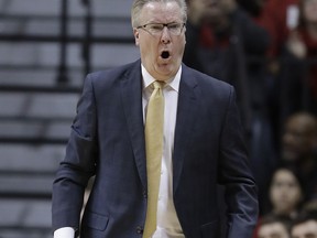 Iowa head coach Fran McCaffery argues a call during the first half of an NCAA college basketball game against Indiana, Monday, Dec. 4, 2017, in Bloomington, Ind.