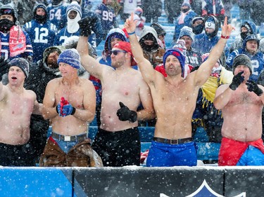 ORCHARD PARK, NY - DECEMBER 10:  Fans cheer during while not wearing shirts during the fourth quarter of a game between the Buffalo Bills and Indianapolis Colts on December 10, 2017 at New Era Field in Orchard Park, New York.  (Photo by Tom Szczerbowski/Getty Images)
