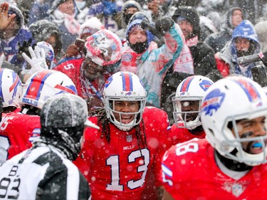 ORCHARD PARK, NY - DECEMBER 10:  Kelvin Benjamin #13 of the Buffalo Bills celebrates with teammates after scoring a touchdown during the second quarter against the Buffalo Bills on December 10, 2017 at New Era Field in Orchard Park, New York.  (Photo by Brett Carlsen/Getty Images)