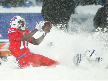 ORCHARD PARK, NY - DECEMBER 10:  Deonte Thompson #10 of the Buffalo Bills catches the ball as Kenny Moore #42 of the Indianapolis Colts attempts to defend him during overtime on December 10, 2017 at New Era Field in Orchard Park, New York.  (Photo by Brett Carlsen/Getty Images)