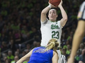 Notre Dame's Jessica Shepard (23) shoots over DePaul's Kelly Campbell (20) during the first half of an NCAA college basketball game Sunday, Dec. 17, 2017, in South Bend, Ind.