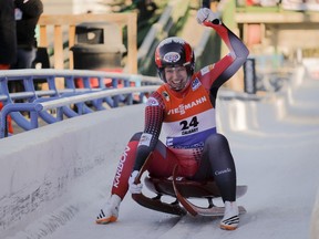 Canada's Alex Gough, celebrates her second place finish in the women's World Cup luge competition in Calgary, Saturday, Dec. 9, 2017.THE CANADIAN PRESS/Jeff McIntosh