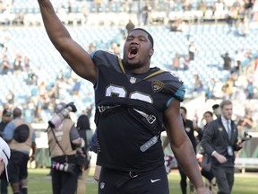 Jacksonville Jaguars defensive lineman Calais Campbell celebrates after defeating the Houston Texans in an NFL football game, Sunday, Dec. 17, 2017, in Jacksonville, Fla.