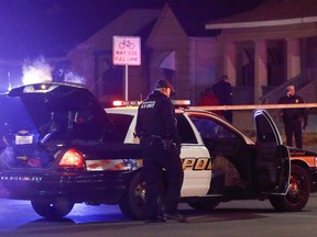Wichita police investigate a call of a possible hostage situation near the corner of McCormick and Seneca in Wichita, Ks Thursday night 12/28. A man was fatally shot by a police officer in what is believed to be a gaming prank called "swatting."