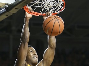 Wichita State forward Darral Willis Jr. dunks against Arkansas State during the first half of an NCAA college basketball game, Tuesday, Dec. 19, 2017 in Wichita, Kan.