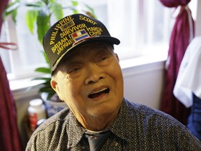 FILE - In this Thursday, April 6, 2017 file photo, Bataan Death March survivor Ramon Regalado reminisces at his home in El Cerrito, Calif. Regalado died Dec. 16, 2017,  in El Cerrito, California, said Cecilia I. Gaerlan, executive director of the Bataan Legacy Historical Society. He was 100.