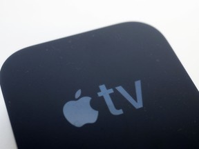 FILE - This Sept. 15, 2017, file photo shows the Apple TV streaming device, on display in New York. Amazon is angling for a truce in its two-year battle with Apple and Google over streaming gadgets: It says it is preparing to put Apple TV and Chromecast back on sale. A spokeswoman for Amazon confirmed Friday, Dec. 15, 2017, it is preparing to sell the devices. Links to the products appeared on Amazon.com but indicate they are still unavailable.