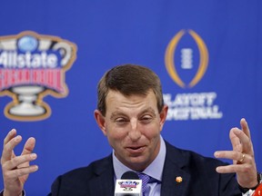 Clemson head coach Dabo Swinney talks to reporters during media day for the upcoming Sugar Bowl semi-final playoff game against Alabama, for the NCAA college football national championship, in New Orleans, Saturday, Dec. 30, 2017.