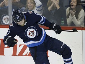 Winnipeg Jets'  Patrik Laine celebrates after scoring against the Vegas Golden Knights in NHL action Friday in Winnipeg. Laine had a goal and two assists in Winnipeg's 7-4 victory.