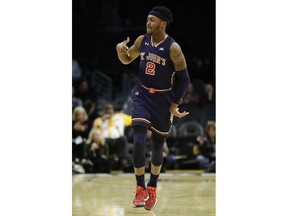 St. John's guard Shamorie Ponds celebrates after scoring against Arizona State during the first half of an NCAA college basketball game in Los Angeles, Friday, Dec. 8, 2017.