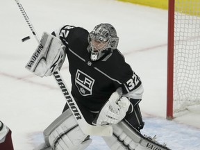 Los Angeles Kings goalie Jonathan Quick blocks a shot during the first period of the team's NHL hockey game against the Colorado Avalanche in Los Angeles, Thursday, Dec. 21, 2017.