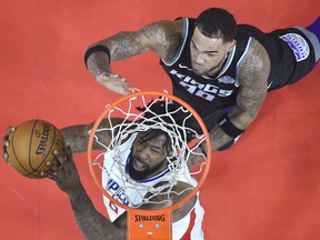 LA Clippers center DeAndre Jordan shoots past Sacramento Kings guard Frank Mason III during the first half of an NBA basketball game in Los Angeles, Tuesday, Dec. 26, 2017.