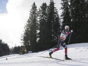 Martin Johnsrud Sundby of Norway skis to take the third place in the men's 15 kilometer cross country skiing race at the Tour de Ski in Lenzerheide, Switzerland, Sunday, Dec. 31, 2017.