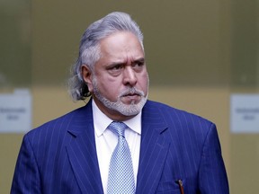 FILE - In this Nov. 20, 2017 file photo, Indian tycoon Vijay Mallya leaves after attending a hearing at Westminster Magistrates Court in London. Mallya is due back in court in London on Monday, Dec. 4, 2017, for the start of an extradition hearing due to last about eight days that should determine whether he will be sent back to India to face money laundering allegations related to the collapse of several of his businesses.