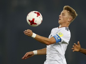 FILE - In this Oct. 16, 2017 file photo Germany's Jann Fiete Arp controls the ball during the FIFA U-17 World Cup against Colombia in New Delhi, India. Hamburger SV is relying heavily on the 17-year-old school-kid to avoid its first ever relegation from the Bundesliga. Arp has played in the side's last five games – starting the last four – and chipped in two goals as Hamburg claimed two wins and a draw to move just above the relegation zone.