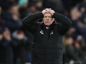 West Ham's manager David Moyes reacts from the side line during the English Premier League soccer match between West Ham and Arsenal at the London stadium in London, Wednesday, Dec. 13, 2017.