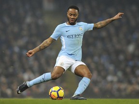 FILE - In this file photo dated Saturday, Dec. 16, 2017, Manchester City's Raheem Sterling during the English Premier League soccer match against Tottenham Hotspur at Etihad stadium, in Manchester, England.  A man, named Karl Anderson, on Wednesday Dec. 20, 2017, has been given a 16-week prison sentence for racially assaulting Manchester City winger Raheem Sterling outside the club's training ground.