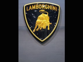 FILE - This Wednesday, March 2, 2005 file photo shows the logo of Italian sportscar manufacturer Lamborghini on the press day at the 75th Geneva International Motor Show in Geneva, Switzerland. Supercar makers want in on the profits in the market for SUVs, which has been growing quickly, and Lamborghini is the latest brand to unveil a high-end model.
