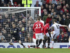 Burnley's Ashley Barnes scores his side's first goal of the game during the English Premier League soccer match against Manchester United at Old Trafford, Manchester, England, Tuesday, Dec. 26, 2017.