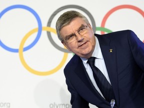 International Olympic Committee (IOC) president Thomas Bach, from Germany speaks during a media conference after the second day of the executive board meeting of the International Olympic Committee (IOC), in Lausanne, Switzerland, Wednesday, Dec. 6, 2017.  The International Olympic Committee on Tuesday banned the Russian Olympic team from the upcoming South Korea games as punishment for doping violations at the 2014 Sochi Olympics.