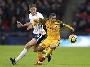 Tottenham Hotspur's Jan Vertonghen, left, and Brighton & Hove Albion's Anthony Knockaert in action during their English Premier League soccer match at Wembley Stadium in London, Wednesday Dec. 13, 2017.