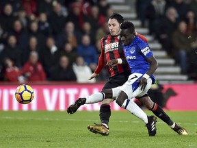 Everton's Idrissa Gueye, right, scores his side's first goal of the game against Bournemouth during the English Premier League soccer match against Everton at the Vitality Stadium, Bournemouth, England, Saturday Dec. 30, 2017.