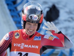 Canada's Alex Gough, celebrates her second-place finish in the women's World Cup luge competition in Calgary, Saturday, Dec. 9, 2017.