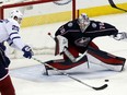 Blue Jackets goalie Joonas Korpisalo stops a shot against Toronto Maple Leafs' James van Riemsdyk during the third period of their game in Columbus, Ohio, on Wednesday night. The Blue Jackets won 4-2.