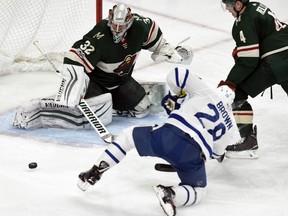 Minnesota Wild goalie Alex Stalock blocks a shot by the Toronto Maple Leafs' Connor Brown during the third period of their game Thursday night in St. Paul, Minn. The Wild won 2-0.