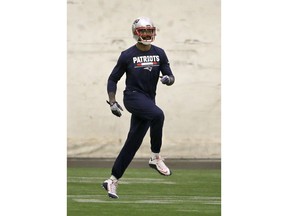 New England Patriots wide receiver Kenny Britt warms up during an NFL football practice, Wednesday, Dec. 13, 2017, in Foxborough, Mass.