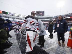 Canada goaltender Carter Hart takes to the ice before the start of the IIHF World Junior Championship preliminary round outdoor game against the USA at New Era Field in Orchard Park, N.Y., Friday December 29, 2017. Hart will be back in net when Canada plays Denmark on Saturday night in its final preliminary round game of the world junior hockey championship.