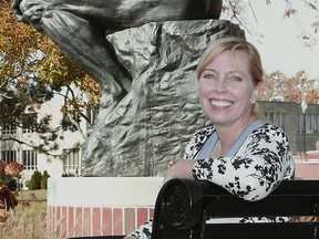 In this October 2012 photo, Stephanie Jass of Tecumseh, Mich., poses at Adrian College in Adrian, Mich. Jass, who won seven games on "Jeopardy!" in 2012, was arraigned Tuesday, Dec. 5, 2017, on two computer-related charges that allege she accessed co-workers' email accounts earlier this year at Adrian College.