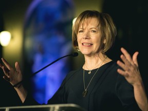 FILE - In this Jan. 10, 2015, file photo, Minnesota Lt. Gov. Tina Smith speaks in St. Paul, Minn. Smith is a possible replacement to fill U.S. Sen. Al Franken's seat after he announced his resignation amid multiple sexual misconduct allegations Thursday, Dec. 7, 2017, on the Senate floor in Washington. His resignation means Minnesota Gov. Mark Dayton, a fellow Democrat, will name a temporary replacement. The winner of a special election in November would serve through the end of Franken's term in January of 2021.