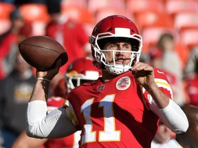 Kansas City Chiefs quarterback Alex Smith (11) throws during warmups before an NFL football game against the Oakland Raiders in Kansas City, Mo., Sunday, Dec. 10, 2017.