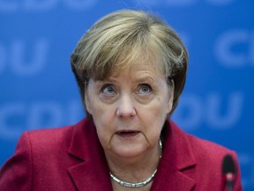 Christian Democratic Union party chairwoman and German Chancellor Angela Merkel attends a party's leaders meeting at the headquarters in Berlin, Monday, Dec. 11, 2017.
